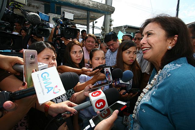 Vice President Robredo talks to the media after the distribution of lot titles to the residents. (CONTRIBUTED PHOTO)