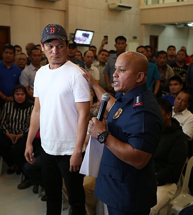  Central Visayas’ now number one drug lord Franz Sabalones surrenders to Philippine National Police (PNP) Director General Ronald “Bato” dela Rosa at Camp Crame and reveals his drug sources and police protectors. (INQUIRER FILE PHOTO)