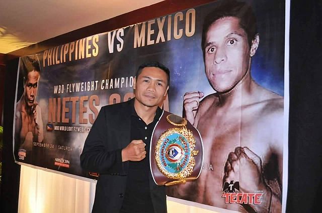 Two-division world champion and longest-reigning Filipino world champion Donnie Nietes shows his WBO junior flyweight belt during a press conference for the Pinoy Pride 38 at the Waterfront Cebu City Hotel and Casino. (CONTRIBUTED)