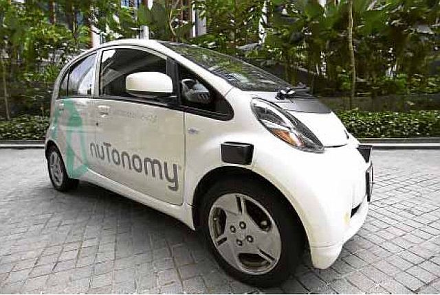 An autonomous vehicle will be picking up passengers on a test-drive in Singapore. Officials of nuTonomy aim to have a self-driving taxi fleet by 2018.  (AP)