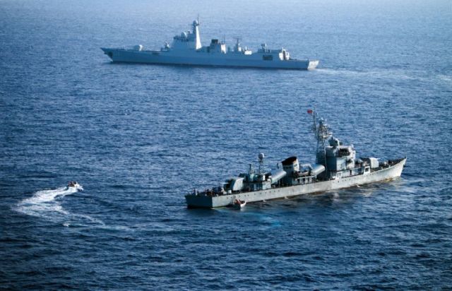 China took control of Scarborough shoal in 2012 after a standoff with the Philippine Navy and has since deployed large fishing fleets while blocking Filipino fishermen (AFP).