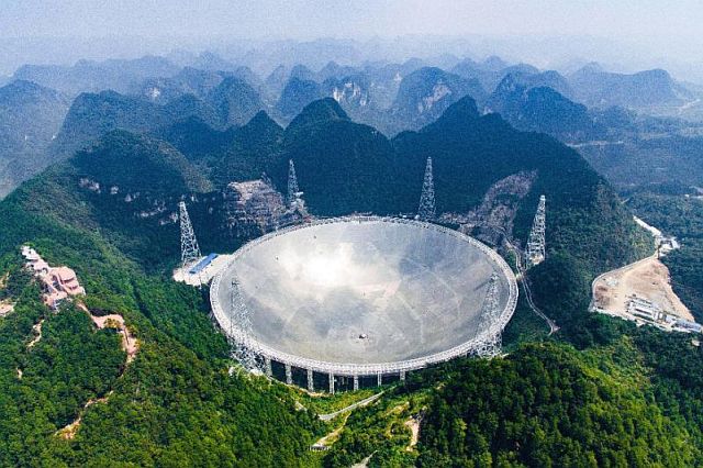 A photo released by Xinhua News Agency shows an aerial view of the 500-meter Aperture Spherical Telescope (FAST) in the remote Pingtang county in southwest China's Guizhou province.  (AP)