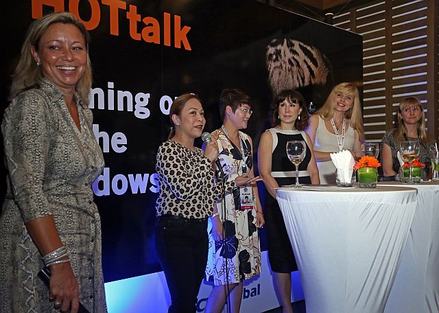 Gina Nomellini, chief finance officer of GTT (4th from left) and Natalia Ellis, chief finance officer of Speedflow Communications LTD (5th from left) are among the top women executives-panelists in the Hottalk forum at the Movenpick Hotel Cebu (CDN PHOTO/LITO TECSON)