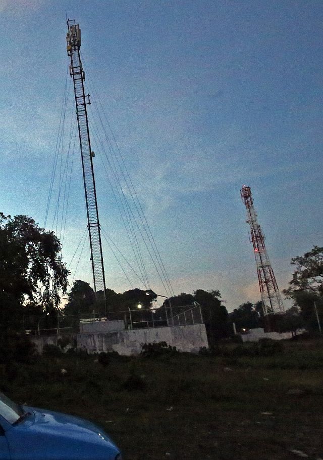 The Globe and Sun Cellular cell towers in Sitio Calvary Barangay Apas (CDN FILE PHOTO).