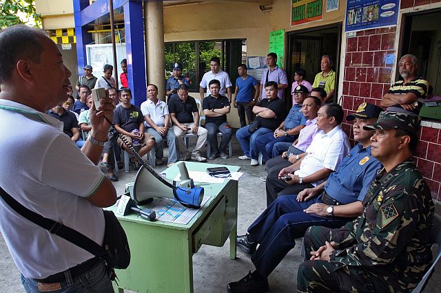 MGen. Raul Del Rosario (seated right), Commander of the AFP  Central Command (CENTCOM), and PRO-7 Director Chief Supt. Noli Taliño listen to a Muslim official who  vowed that Muslims in the region will support the government in securing the peace and order here (CDN PHOTO/JUNJIE MENDOZA).