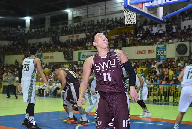 SWU star Mark Jayven Tallo celebrates after scoring on a layup while being fouled. Tallo helped steer the Cobras over UV yesterday. (CONTRIBUTED PHOTO/RON TOLIN)