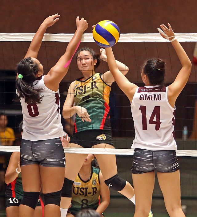 Paula Marie Maninang of USJ-R finds a hole in the defense of the SWU Lady Cobras during their game yesterday at the start of the 2016 CESAFI women’s volleyball at the USC gym. (CDN PHOTO/LITO TECSON)