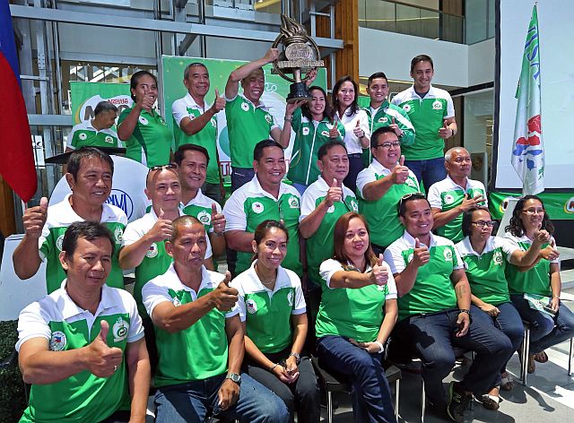 Organizers and officials of the Milo Little Olympics Visayas Regional Finals gather after a press conference at the SM Seaside City Cebu. With them is Olympian Mary Joy Tabal (top row, fourth from left) (CDN PHOTO/LITO TECSON).