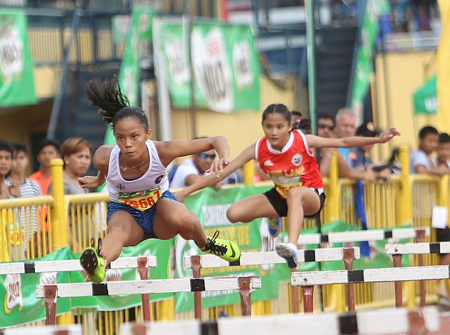 Brittney Cañete of Ateneo de Cebu competes in secondary hurdles event of the Milo Little Olympics Visayas at the Cebu City Sports Center (CDN PHOTO/LITO TECSON)