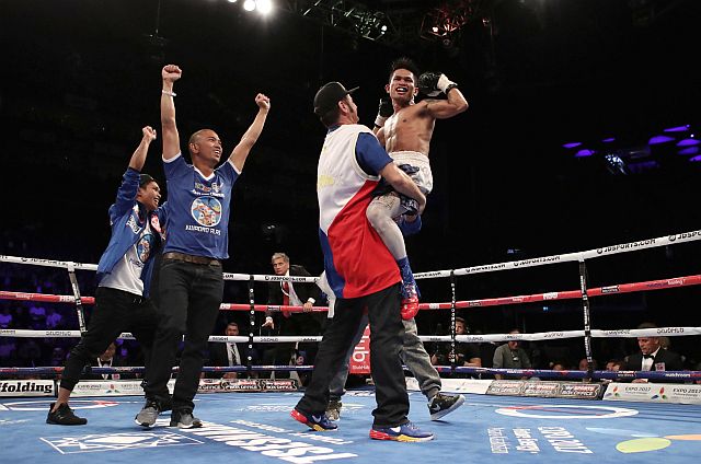 Johnreil Casimero celebrates after beating Charlie Edwards in their IBF flyweight championship bout at The O2 Arena, London (AP).