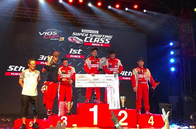 Cebuano Jette Calderon of Toyota Team Cebu/GM Motorsport stands atop the podium after ruling the Super Sporting class of Race 3 of the Vios Cup (CONTRIBUTED PHOTO/ROY SABAY).