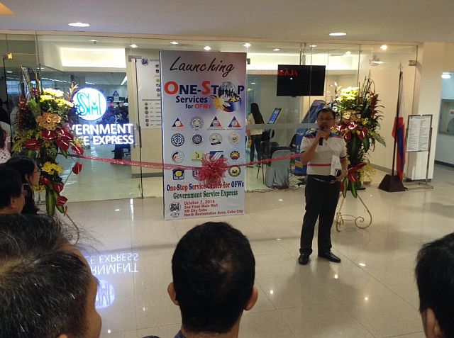Department of Labor and Employment in Central Visayas (DOLE 7) director Ezekiel Sarcauga leads opening of One-Stop Services shop for Overseas Filipino Workers (OFWs) at the second floor of SM City Cebu (CDN PHOTO/ DOMINIC YASAY).