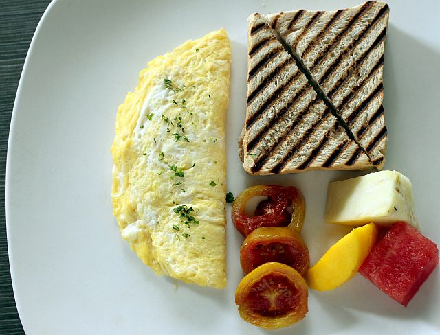 2 Egg Omelets with Thick Whole Wheat Bread, Seasonal Fruit P125. 