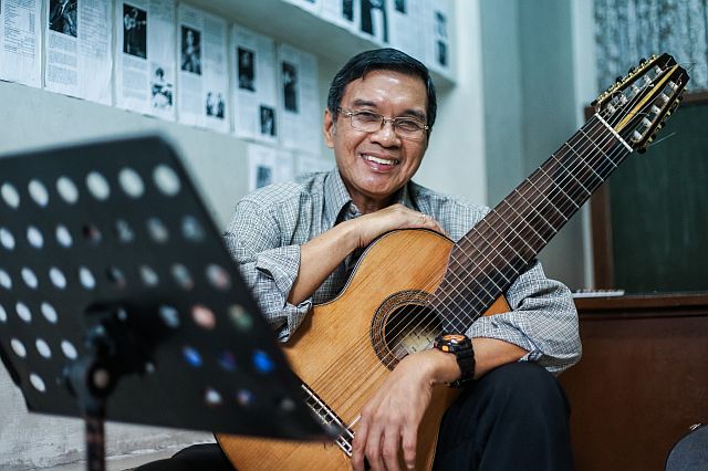 SELF TAUGHT. Having mastered the guitar in his teen years, Jose Valdez now shares his knowledge with students of four schools in Manila.
