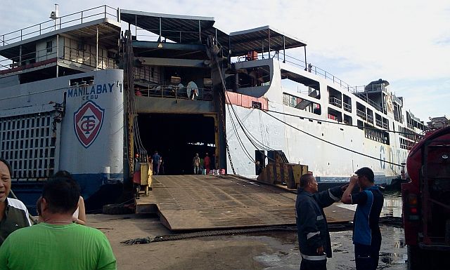 manila Bay 1 docked at Pier 7 in Mandaue reclamation area caught fire believed to be caused by electrical short circuit.(CDN PHOTO/NORMAN MENDOZA)