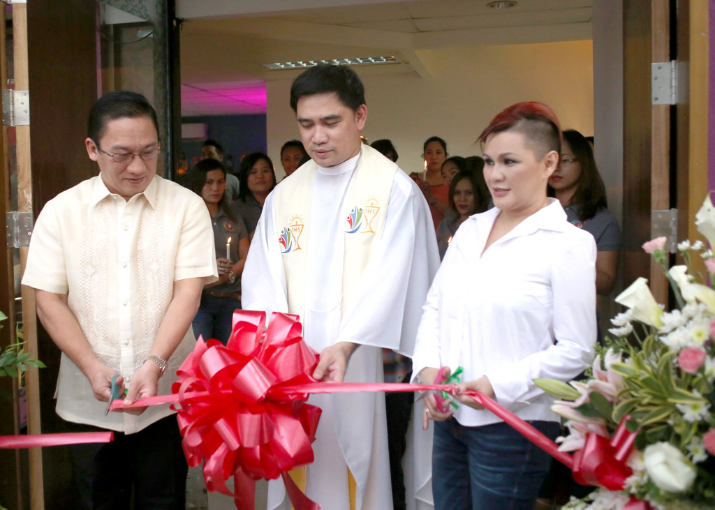 Congressman Jonas Cortes, Fr, Joseph de Aquino and Miss Caroline Tan Porras cut the ribbon during the opening of Hagia Sophia Café at the corner of National Hi-way (MC Briones) and  Jaime St., Mandaue City. It was a triple celebration as it was also the 14th anniversary Clint.KAMMS Corporation and Miss Porras’ birthday. 