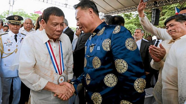 President Rodrigo Duterte welcomes Ambassador to the Philippines Zhao Jianhua during the  celebration of the National Heroes’ Day in this August 29 photo.  (PPD FILE) 