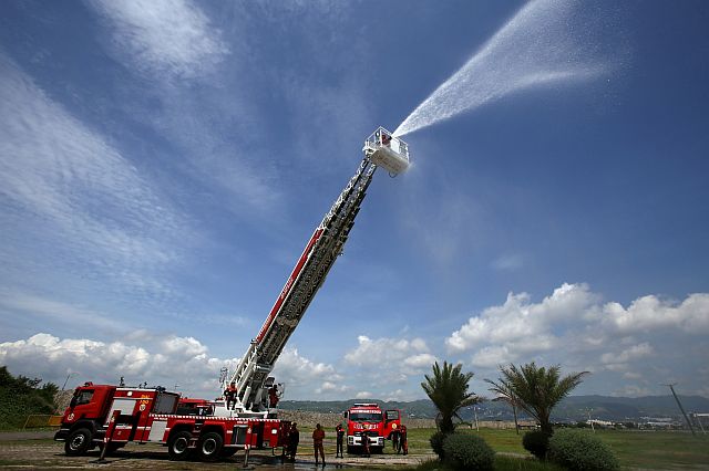 The new aerial ladder truck that can reach up to 18 storeys (CDN PHOTO/JUNJIE MENDOZA).