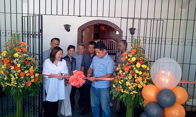 Lawyer Marie dela Cerna-Teves (front left) and Mandaue City Vice Mayor Carlo Fortuna (right) cut the ribbon during the inauguration and blessing of the Bridge of Hope (BH) Drug Rehabilitation Center that used to be the home of former governor Vicente dela Cerna (CDN PHOTO/NORMAN MENDOZA).