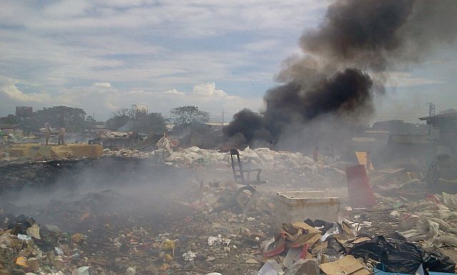The Department of Environment and Natural Resources has issued an order for the owner of this privately owned dumpsite in Barangay Umapad to stop its operations (CDN FILE PHOTO). 