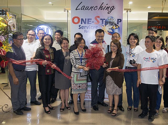 ONE STOP SERVICE CENTER FOR OFW/OCT. 09, 2016 A one stop service center for OFWs opens at the 2nd level of SM City Cebu. Ms. Tata Mempin - SM's assistant mall manager; Sherry Tuvilla - Visayas regional operations manager for SM Supermalls; Exequiel R. Sarcauda - DOLE7 Regional Director and Amuerfina R. Reyes - DOLE Assistant Secretary. (CDN PHOTO/CHRISTIAN MANINGO)