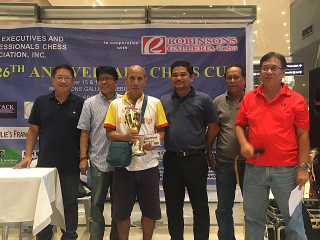 Carlos Moreno (third from left) receives his trophy and cash prize from Cepca officials (CONTRIBUTED PHOTO).