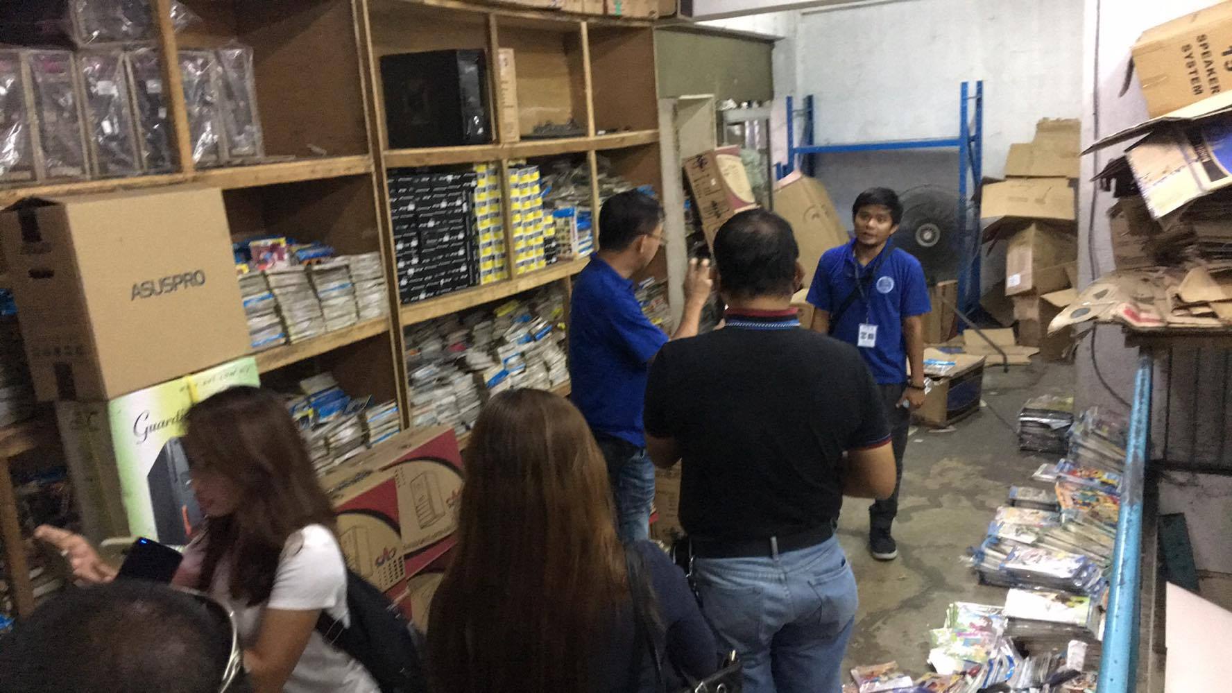A raid was conducted inside the warehouse in Cebu City Thursday morning by the Optical Media Board. (CDN PHOTO/ JOSE SANTINO BUNACHITA)