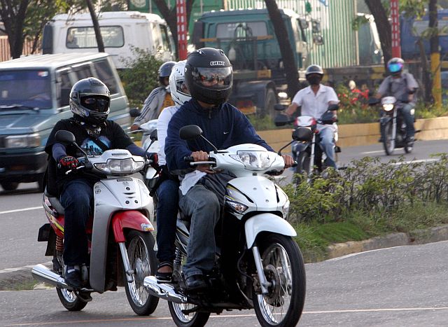 Some motorcycle riders wear full face helmets, making it difficult for police or anyone to identify them. (CDN File Photo). 