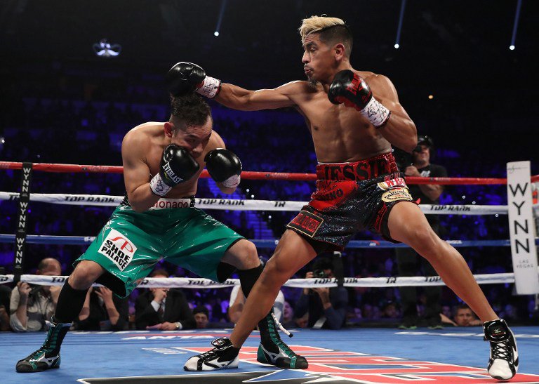Jessie Magdaleno lands a right to the head of opponent Nonito Donaire of the Philippines during their WBO junior featherweight championship fight at the Thomas & Mack Center (AFP). 