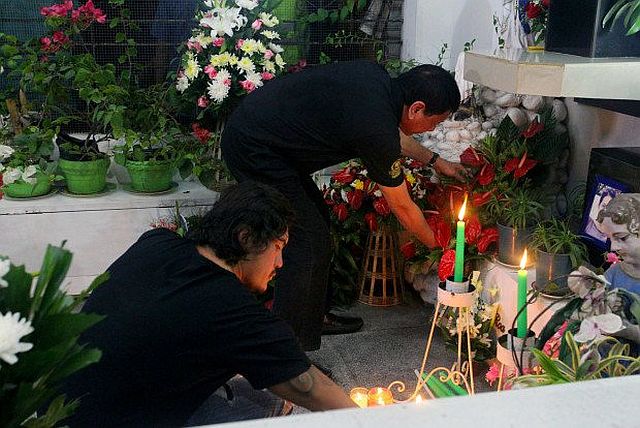 President Rodrigo Duterte visits his parents’ resting place at the Roman Catholic Cemetery in Davao City on November 1. He is accompanied by his youngest son, Sebastian Duterte (INQUIRER.net). 
