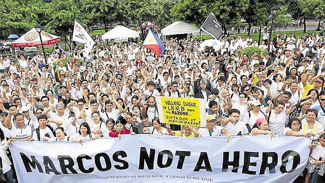 Hundreds of people gather at the Lapu-Lapu monument in Rizal Park, Manila to protest the burial of dictator Ferdinand Marcos at the Libingan ng mga Bayani (INQUIRER.Net). 