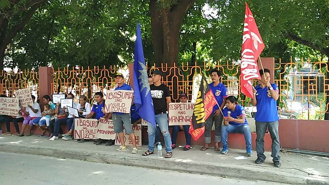 Fisherfolk rally in front of the Department of Environment and Natural Resources (DENR-7) office in Barangay Sudlon, Lahug (CDN PHOTO/ CHRISTIAN MANINGO). 
