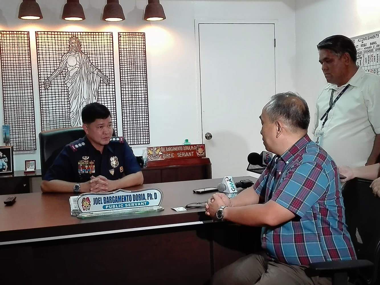 LTFRB-7 director Ahmed Cuizon meets with senior CCPO director Supt. Joel Doria. (CDN PHOTO/MICHAELA DOLORES)