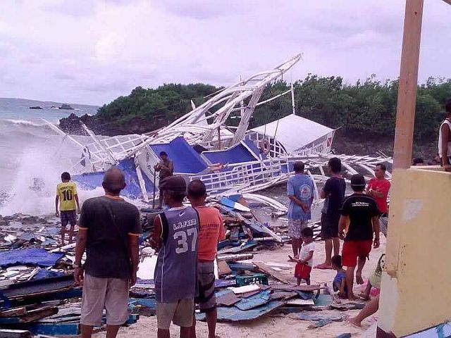 A motorbanca was washed ashore in Daanbantayan town, north of Cebu. Marce made a landfall in Daanbantayan at 1:30 a.m. on Friday. (CONTRIBUTED PHOTO/STEPHEN KING DE DIOS)
