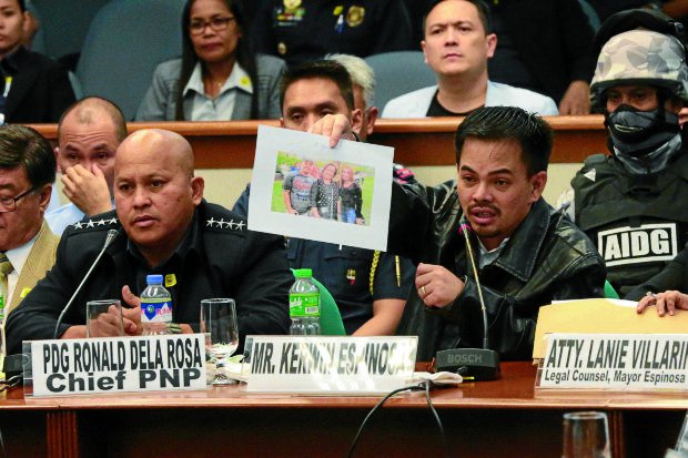 Kerwin Espinosa testifying before Senate committee on public order and dangerous drugs aided by his lawyer, Atty. Lanie Villarino (INQUIRER FILE PHOTO). 