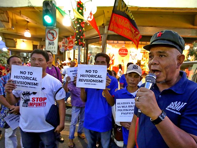  NO TO HISTORICAL REVISIONISM. Members of the militant Bagong Alyansang Makabayan (Bayan) decry plan to bury ousted dictator Ferdinand Marcos at the Libingan ng mga Bayani in a rally held along Colon Street, Cebu City on Sunday, Nov. 13, 2016 (CDN PHOTO/JUNJIE MENDOZA). 