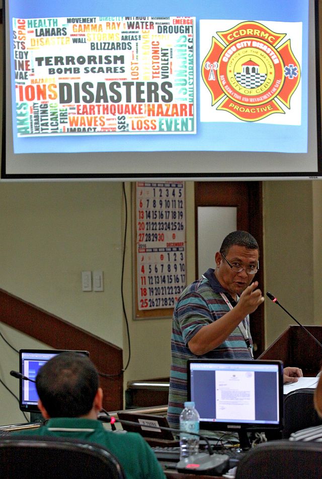 Cebu City Disaster Risk Reduction Management Office (CCDRRMO) head Nagiel Bañacia explains to the Cebu City Council committee on budget and finance why his office needs a total of P350.8 million budget for next year (CDN PHOTO/JUNJIE MENDOZA).