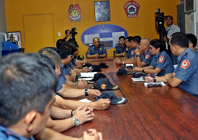 PRO-7 Regional Director Chief Supt. Noli Taliño presides over a command conference at the  Cebu City Police headquarters in Camp Sotero Cabahug where Cebu City police chief,  Senior Supt. Joel Doria also later told reporters that drug dealers were now using video karera games as a front to their illegal drug operations (CDN PHOTO/LITO TECSON)  