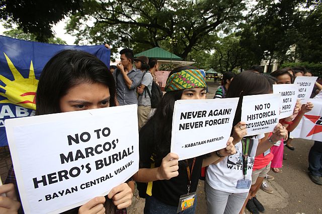 Students of the University of the Philippines College Cebu (UPCC)  stage a lightning protest  against the burial of late dictator Ferdinand Marcos minutes after hearing news of his scheduled burial at the Libingan ng mga Bayani (LNMB) at 12 noon, Friday. (CDN PHOTO/JUNJIE MENDOZA)