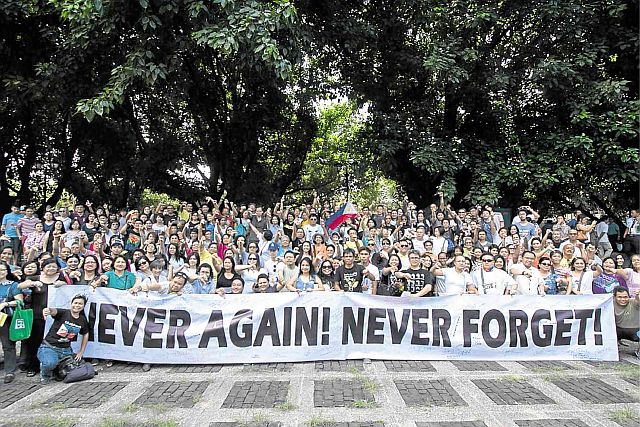 FREEDOM lovers gather at the Bantayog ng mga Bayani — a memorial center built to honor the victims of martial law — to share their experiences under the Ferdinand  Marcos dictatorship and make their opposition known against the burial of the  ousted strongman at the Libingan ng mga Bayani. (INQUIRER PHOTO). 