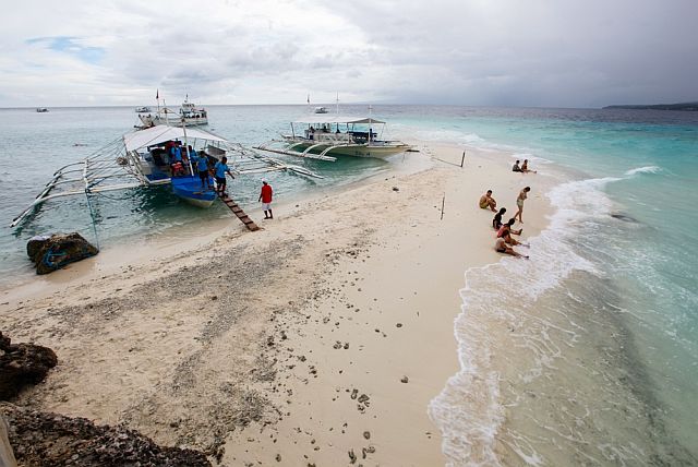 The sandbar of Sumilon Island is a key attraction for tourists drawn to the island resort located just off the southern Cebu town of Oslob.    