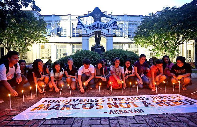 Students of the University of the Philippines College Cebu stage a protest immediately after hearing about the Supreme Court decision to allow the burial of former president Ferdinand Marcos at the Libingan ng mga Bayani (LNMB), Tuesday (CDN PHOTO/LITO TECSON). 