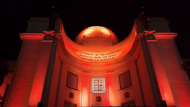 ORANGE GLOW. At precisely 7:15 p.m. of November 25, Cebu Gov. Hilario Davide III and Department of Tourism - Central Visayas  OIC Judy dela Cruz Gabato lead the ceremonial lighting of the Provincial Capitol Building for the 18-day Campaign to End Violence Against Women. Gabato says DOT and the Philippine Commission on Women decided on the color orange to signify “a brighter and VAW-free Philippines.”(CDN PHOTO/MOREXETTE ERRAM)