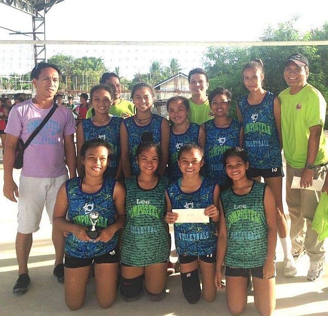 Cresilda Rondina (third from the left, front row) poses with her teammates after winning the Compostela Volleyball Tournament last August (CONTRIBUTED). 