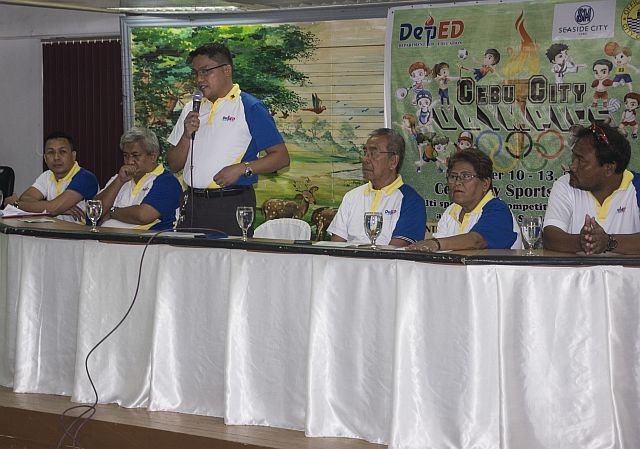 Organizers and officials of the Department of the Education-Cebu City launch the 26th Cebu City Olympics, which gets going today at the Cebu City Sports Center. (CDN PHOTO/CHRISTIAN MANINGO) 