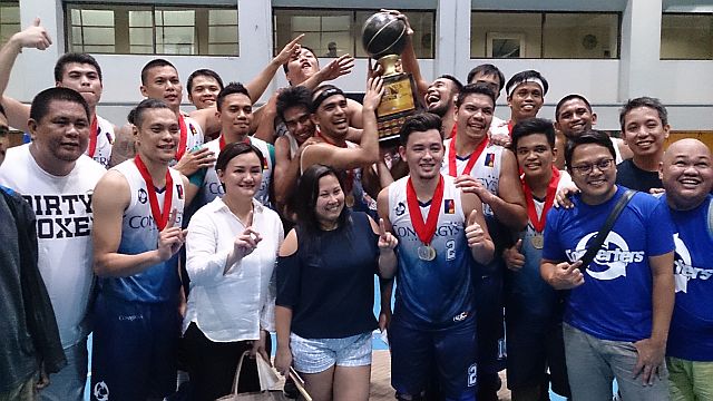 Members of the Convergys Converters celebrate their championship victory in the Elite Classic division (CONTRIBUTED). 