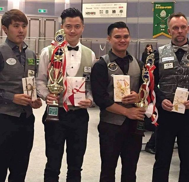 JAPAN 9-BALL WINNERS. From left, Chang Yuan of Taiwan (semifinalist), Ko Pin-yi of Taiwan (champion), Jeffrey de Luna of the Philippines (second place) and Thorsten Hohmann of Germany (semifinalist) pose with their prizes at the awards ceremony.