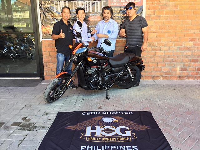 From left, Harley-Davidson of Cebu sales executive Scout Tumulak. H-D of Cebu dealer principal Regan King, grand prize winner Bryan  Teson and HOG director Chico Ramas with the H-D Street 750 bike (CONTRIBUTED PHOTO). 