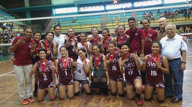 Players and coaches of the Southwestern University Cobras celebrate after they made it four-in-a-row by winning this year's Cesafi women's volleyball crown at the expense of the University of San Jose-Recoletos Jaguars. The Cobras received their medals from league commissioner Felix Tiukinhoy Jr. (right). (CDN PHOTO/LITO TECSON)