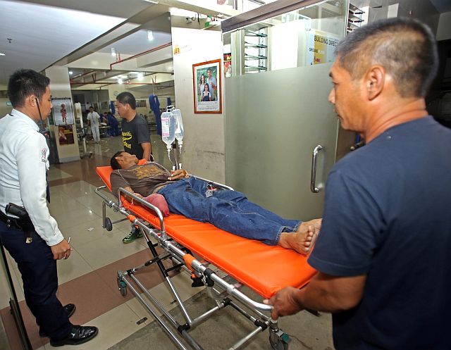 While firecracker injuries have gone down in recent years, hospitals are still placed on white alert to attend to victims especially in the provinces, like this firecracker victim from Compostela town who was rushed to the Vicente Sotto Memorial Medical Center in January 1 this year.  (CDN File Photo). 